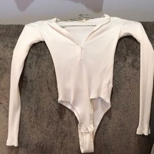 Makers of dream body suit xs white